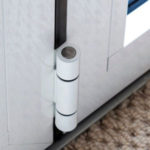 example of white colour matched hinges on an aluminium door