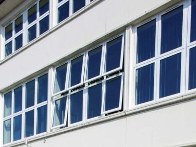 image of white casement windows installed on an educational school building