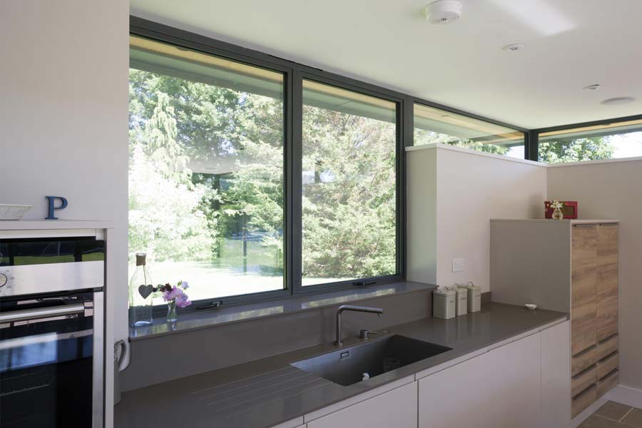 aluminium-casement-windows-sussex-smarts-alitherm-300 grey aluminium casement windows in a modern kitchen