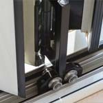 example of stainless steel wheels on aluminium doors
