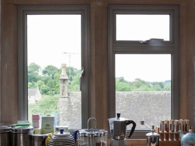 residential-alitherm-heritage-windows-sussex-aluminium-systems light grey aluminium heritage windows in a kitchen