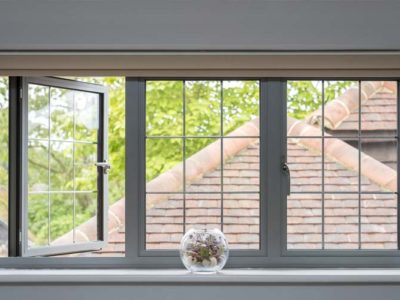 OW 70 Slimline Aliminium Casement window in grey with window open